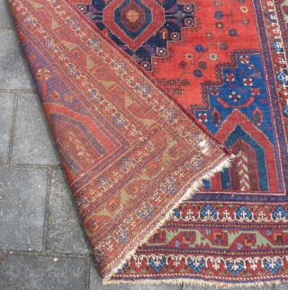 Afshar rug, ca. 1920, 211  x 161 cm., 6'11" x 5'3". In general good pile with original sides and endings. Corroded browns, a bit of lower pile at the central part  ...