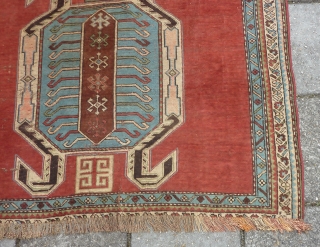 Caucasian Lenkoran, end of 19th cent., 170 x 118 cm.
Missing outer guard border; natural dyes and a faded pinkish red.             