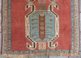 Caucasian Lenkoran, end of 19th cent., 170 x 118 cm.
Missing outer guard border; natural dyes and a faded pinkish red.             