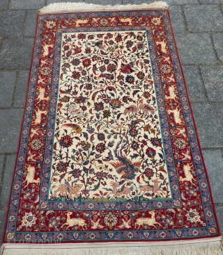Isfahan, 160 x 105 cm., 5' 3" x 3' 5", in absolute mint condition. Knotted with the finest quality of wool on a silk foundation ( 10 x 10 per cm2 ).  ...