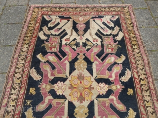 Early Caucasian Kuba kelleh, 19th c., 333 x 135 cm., 10'11" x 4'6". On woolen structure and with a few old repairs. All natural dyes.        