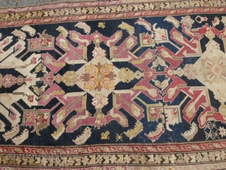 Early Caucasian Kuba kelleh, 19th c., 333 x 135 cm., 10'11" x 4'6". On woolen structure and with a few old repairs. All natural dyes.        