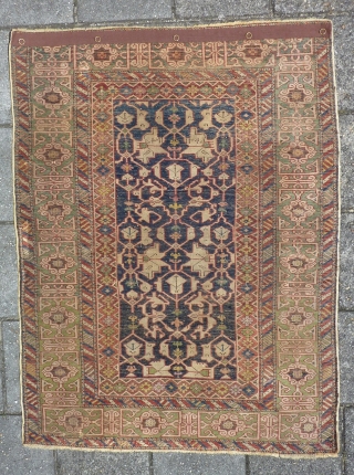 Kuba Konagkend, 130 x 100 cm., dated 1879 (1295). Good pile all over without any wear. Selvedges replaced, endings reknotted for about a half inch and two small repairs ( pictured ),  ...