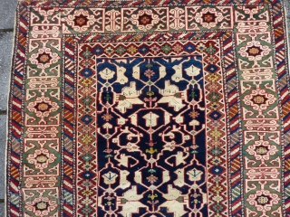 Kuba Konagkend, 130 x 100 cm., dated 1879 (1295). Good pile all over without any wear. Selvedges replaced, endings reknotted for about a half inch and two small repairs ( pictured ),  ...