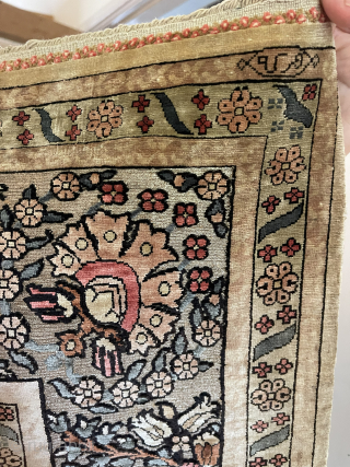 Silk Hereke, 102 x 155 cm., 10 x 10 knots per sq/cm., silk on silk and with silver threads (souf). Mint condition. Ca. mid 20th century. From an old Armenian collection.
Info please ...