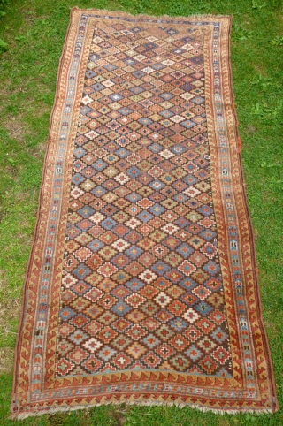 Kurdish Sauj Bulagh, 19th c., 9'3" x 4'2", 280 x 127 cm., with wear and low pile at one end, not washed yet, Sold, ty.        