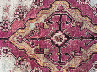 Kirsehir rug, 108 x 147 cm. 19th c. 
All natural dyes with abundant use of cochineal.
Condition as shown, with damages. 
Sides and endings orginal. robvanwieringen@telfort.nl
€ 250       