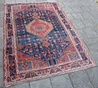 Finely knotted Malayer rug, 212  x 152 cm., 7' x 5', ca. 1900. Thin and floppy handle, with all well saturated natural dyes. Good pile in general, endings secured. A very  ...