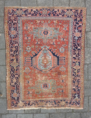 Charming Karaja rug 190  x 153 cm., 6' 3" x 5', around 1900. Alas not in pristine condition: with lot of wear. Also two hardened glue areas at one ending at  ...