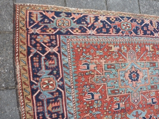 Charming Karaja rug 190  x 153 cm., 6' 3" x 5', around 1900. Alas not in pristine condition: with lot of wear. Also two hardened glue areas at one ending at  ...