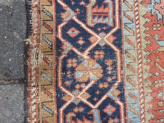 Charming Karaja rug 190  x 153 cm., 6' 3" x 5', around 1900. Alas not in pristine condition: with lot of wear. Also two hardened glue areas at one ending at  ...