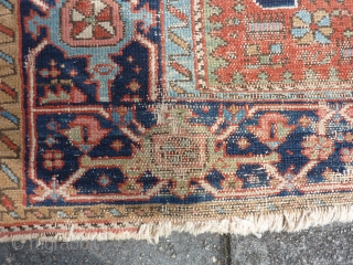 Charming Karaja rug 190  x 153 cm., 6' 3" x 5', around 1900. Alas not in pristine condition: with lot of wear. Also two hardened glue areas at one ending at  ...