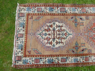 Serab runner, 428 x 96 cm., 14'1" x 3'2", ca. 1900. Thick, wooly pile and soft, all natural dyes on camelwool ground. One tiny lower area and loss of the small guard  ...