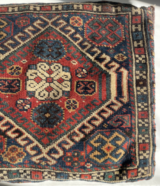 Antique Qashqai Bag + its original kilim backside, made in to a pillow. Low pile and one area with wear ( detail pict.). Last picture in full sunshine. robvanwieringen@telfort.nl    