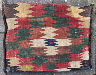 Antique Qashqai Bag + its original kilim backside, made in to a pillow. Low pile and one area with wear ( detail pict.). Last picture in full sunshine. robvanwieringen@telfort.nl    