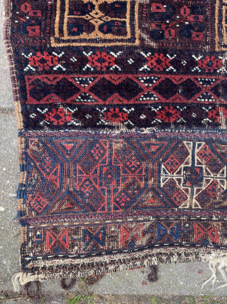 Antique Baluch cradle, very rare, late 19th c., 85 x 68 cm. Knotting is Asy open left.
With some metal thread highlights, some green silk details and a few knots of fuchsine dyed  ...