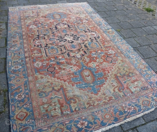 Antique Heriz, 329  x 216 cm., 10' 10" x 7'1", ca. 1900. with soft colours. Missing its outer guard border and with scattered wear. No rot, just dusty.    