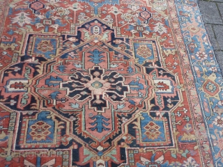 Antique Heriz, 329  x 216 cm., 10' 10" x 7'1", ca. 1900. with soft colours. Missing its outer guard border and with scattered wear. No rot, just dusty.    