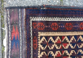 Strong Baluch balisht with kilim back, 99  x 42 cm., 39" x 17". Good condition and pile. All natural dyes except for the three repeating dots in the main border (  ...