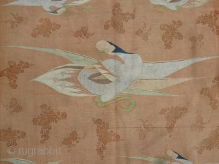 Mongolian or Kansu (?) tapestry with cranes, 2nd half 19th century,185 x 135 cm. woolen double-sided eccentric weaving and with henna painted flowering added at one side. Condition as found.   