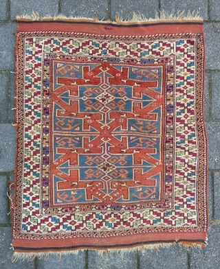 Bergama, 134  x 114 cm., 4' 5" x 3' 9", mid 19th c., with lots of cochenille in the border. Nice positive-negative reciprocity. Sides redone, two little holes, one tiny repair.  ...