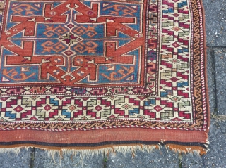 Bergama, 134  x 114 cm., 4' 5" x 3' 9", mid 19th c., with lots of cochenille in the border. Nice positive-negative reciprocity. Sides redone, two little holes, one tiny repair.  ...