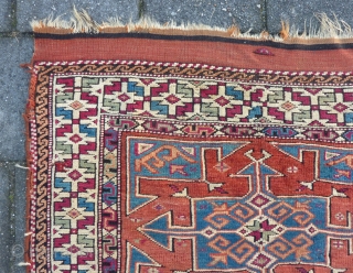 Bergama, 134  x 114 cm., 4' 5" x 3' 9", mid 19th c., with lots of cochenille in the border. Nice positive-negative reciprocity. Sides redone, two little holes, one tiny repair.  ...