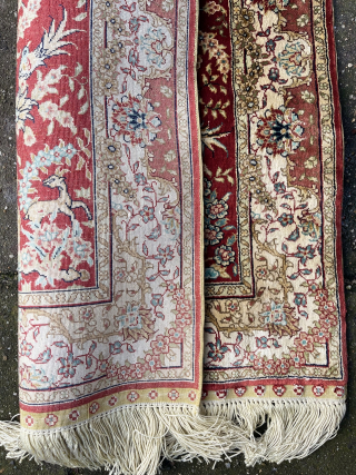 Silk Hereke on silk structure, 63 x 48 cm. ( without fringe), signed. In perfect condition. 10 x 10 knts / sq. cm. robvanwieringen@telfort.nl         