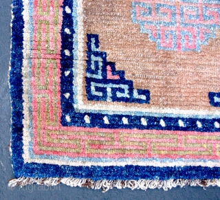 Tibetan Khaden - TC18

51 1/2”  x  27” 
Early ~ mid 20th c.  
100% wool pile sleeping size carpet.
Nice carpet in good solid condition.

POR       