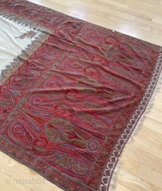 4’7” x 11’2”  / 137cm x 480cm. Kashmir shawl, twill tapestry, pieced construction, embroidered lappets, good.                