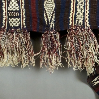 Outat el Haj, Handira
Berber, Middle Atlas Mountains, Morocco
wool, cotton. braided ties
1930
96 x 32 excluding fringe ( 244 x 81 cm )            