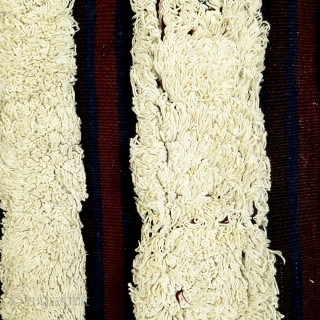 Outat el Haj, Handira
Berber, Middle Atlas Mountains, Morocco
wool, cotton. braided ties
1930
96 x 32 excluding fringe ( 244 x 81 cm )            