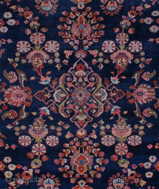 #7050 Mahajaran Sarouk Antique Persian Rug This circa 1910 Mahajaran Sarouk antique Persian Oriental Rug measures 9’1″ X 11’10”. It has the so-called empty design motif with a floral medallion.  It  ...