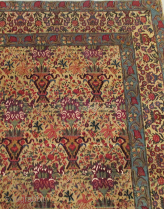 This circa 1900 antique Zilli Sultan #7737 with Silk Persian Oriental rug measures 4’6” X 6’8” (140 x 207 cm). It is very finely woven with repeated vases of flowers completely covering  ...