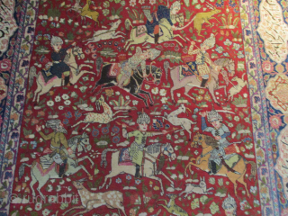 #7383 Tabriz antique Persian rug 'Hunt Scene' This circa 1910 Tabriz measures 4’2” x 6’3” (128 x 192 cm). It has a hunting scene on a tomato red ground completely filled with  ...