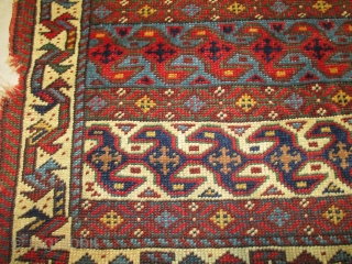 Antique Quashki Rug 1’8” X 1’9” #8093
This 19th century antique Quashki rug measures 1’8” X 1’9”. It has a three panel field consisting of Lazy ‘S’ design, one on an ivory ground  ...
