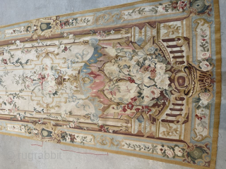 This 19th century Flemish tapestry #8113 measures 2’5” X 6’4”. It is a vertical view of a balcony with columns on either side containing a beautiful floral motif of hanging vines and  ...