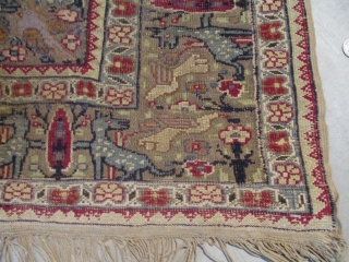 This mid 19th-century Turkish Kayseri silk and metal rug measures 4’4” x 6’10”. It has a center medallion with a double Kum Kopu prayer niche at either end completely covered in a  ...