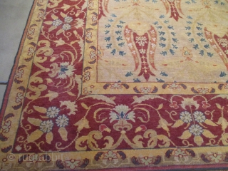 This circa 1910 Antique Turkish rug #7899 measures 8’0” X 11’4”. It has a whimsical repeated design on a butter yellow field offset with blue foliage surrounded with reciprocal  narrow golden  ...