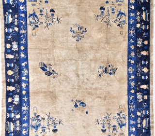 #7726 Antique Peking Chinese Rug 
This circa 1900 Antique Peking Chinese Oriental Rug measures 9’2” x 11’7” (280 x 356 cm). It has a very nice café au lait field with scattered  ...