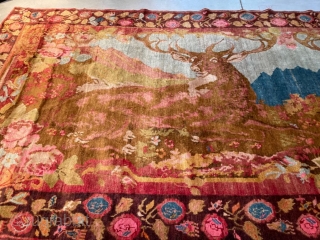 This circa 1900 oversized Armenian Carpet #8106 measures 5’2” X 12’4”. It has two reclining stags with huge antlers staring out at the room as they relax in a forest setting with  ...