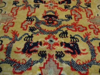 This circa 1880-1900 Ningxia Chinese Oriental rug #8208 measures 3‘9“ x 3‘9“. There are five dragons in shades of blue and Chinese red. The dragons have two colors of blue checkerboard bodies  ...