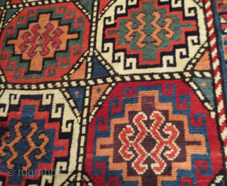 This circa 1875 Mogan #7894 measures 4’2” X 6’10”. It has 18 Memling guls in six rows of three. There is a lot of color in this rug. Red and green on  ...