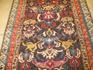 This circa 1850-1875 Kuba Bidjov runner #7909 measures 3’8” X 10’8”. It has a dark brown field containing the very rare and very well-known Bidjov design in tobacco, ivory, light blue, maroon,  ...
