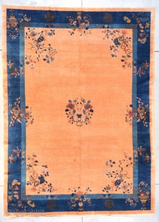 #7677 Peking Chinese Rug
This circa 1900 Peking Chinese Oriental rug measures 9’0” X 12’5” (274 x 381 cm). It has a small medallion of a wreath of flowers on a field color  ...