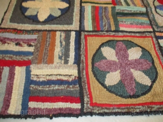 This Antique American Hooked Rug #8076handmade in 1928 measures 9’7” X 10’8”. The motif is 182 separate squares laid out in rows of 13 x 14 squares with millions of different designs  ...