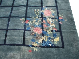 #6111 Antique Peking Chinese Rug 

This circa 1910 Antique Peking Chinese rug measures 9’3” X 11’7”. It has a fantastic design of a riot of flowers in each of the four corners  ...