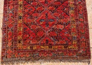 Ersari Beshir Main Carpet,10.8 x 4.9ft. (330 x 150 cm) circa 1880 Classic design with six linked medallions on a mixed navy-blue and dark brown ground.  Main border with vertical star  ...