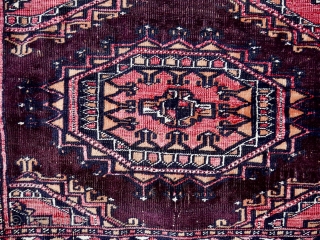 An antique part silk Saryk chuval, 165 x 89 cm. ( 5.4ft x 2.9ft) circa 1880. The dark purple-brown ground with Salor Guls. Each Gul inlaid with magenta silk and white cotton  ...