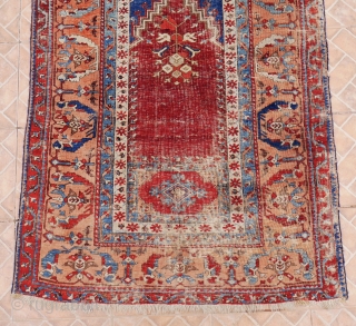 A Ladik/Fertek Prayer Rug, Nigde region, central Anatolia,  6ft x 3.7 ft. (182 x 114 cm.)  Circa 1800. This Tulip Ladik/Fertek rug is divided in four sections with a central  ...